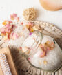 Pink himalayan salt and epson salt mixture with pink rose petals for bath ritual. Image by freepick